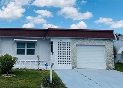 Pre-foreclosure in  NW 74TH AVE Pompano Beach, FL 33063