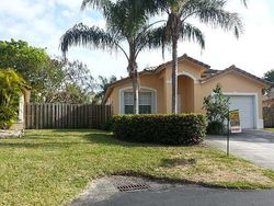 Pre-foreclosure in  SW 214TH ST Miami, FL 33189