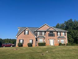 Pre-foreclosure in  DUREN FIELDS PL Lithonia, GA 30058