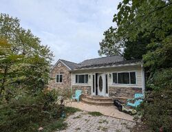 Pre-foreclosure in  POWHATAN BEACH RD Pasadena, MD 21122