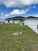 Pre-foreclosure in  NW 22ND PL Cape Coral, FL 33993
