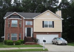 Pre-foreclosure in  REDWOOD TRCE Ellenwood, GA 30294