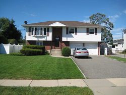 Pre-foreclosure in  DIVISION AVE Hicksville, NY 11801