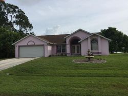 Pre-foreclosure in  SE AIRES LN Port Saint Lucie, FL 34984