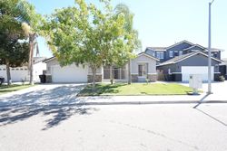 Pre-foreclosure in  TULARE CT Livingston, CA 95334