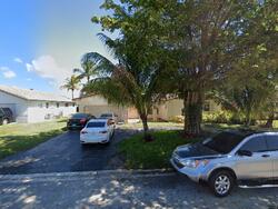 Pre-foreclosure in  NW 84TH LN Pompano Beach, FL 33071