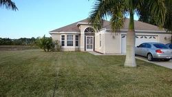 Pre-foreclosure in  CORAL POINT DR Cape Coral, FL 33990