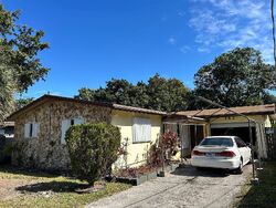 Pre-foreclosure in  NW 8TH AVE Dania, FL 33004