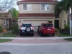 Pre-foreclosure in  NW 125TH TER Pompano Beach, FL 33076