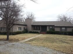 Pre-foreclosure in  E 7TH ST Tulsa, OK 74112