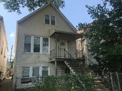 Pre-foreclosure in  S MOZART ST Chicago, IL 60632