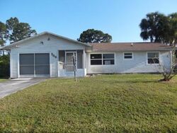 Pre-foreclosure in  SW PRADO AVE Port Saint Lucie, FL 34983