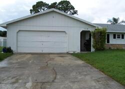 Pre-foreclosure in  SE WHITMORE DR Port Saint Lucie, FL 34984