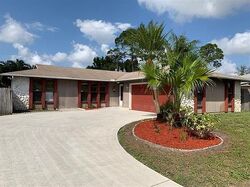 Pre-foreclosure in  NW CARMELITE ST Port Saint Lucie, FL 34983