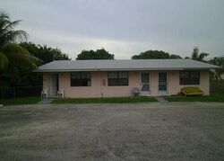 Pre-foreclosure in  SE 9TH ST Hallandale, FL 33009