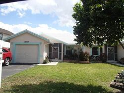 Pre-foreclosure in  NW 33RD ST Pompano Beach, FL 33065