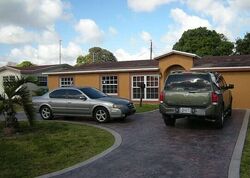 Pre-foreclosure in  PINE TREE DR Hollywood, FL 33023