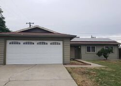 Pre-foreclosure in  E CINNAMON DR Lemoore, CA 93245