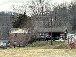 Pre-foreclosure in  SMITH LN Harriman, TN 37748