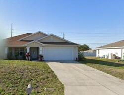 Pre-foreclosure in  NE 24TH TER Cape Coral, FL 33909