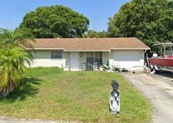 Pre-foreclosure in  SW ARECA DR Palm City, FL 34990