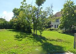 Pre-foreclosure in  WOODLAND AVE Cleveland, OH 44104