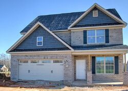 Pre-foreclosure in  STONE GABLES DR Elon, NC 27244