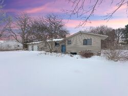 Pre-foreclosure in  SKYWAY DR NE Comstock Park, MI 49321