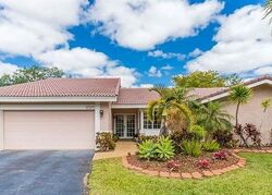 Pre-foreclosure in  NW 107TH LN Pompano Beach, FL 33071