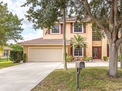 Pre-foreclosure in  NW 103RD TER Pompano Beach, FL 33071