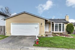 Pre-foreclosure in  VILLAGE PL NW Stanwood, WA 98292
