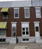 Pre-foreclosure in  N LINWOOD AVE Baltimore, MD 21205