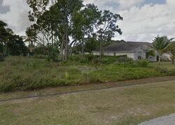 Pre-foreclosure in  NW NORTH MACEDO BLVD Port Saint Lucie, FL 34983