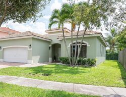 Pre-foreclosure in  SE 14TH CIR Homestead, FL 33035