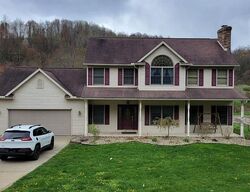 Pre-foreclosure in  GATCHELL RD SE Uhrichsville, OH 44683