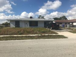 Pre-foreclosure in  NW 1ST TER Pompano Beach, FL 33060