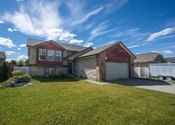 Pre-foreclosure in  E THRUSH DR Post Falls, ID 83854