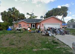 Pre-foreclosure in  OAKFIELD AVE Lehigh Acres, FL 33974
