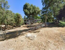 Pre-foreclosure in  QUAIL RUN DR Oakhurst, CA 93644