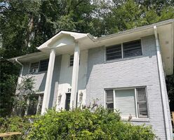 Pre-foreclosure in  ROCKCLIFF RD SE Atlanta, GA 30316