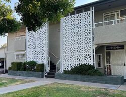 Pre-foreclosure in  N 12TH PL UNIT 7 Phoenix, AZ 85014