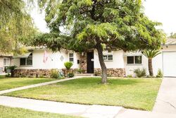 Pre-foreclosure in  N MARIPOSA ST Fresno, CA 93726