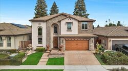 Pre-foreclosure in  N Blue Sage Ave Fresno, CA 93730