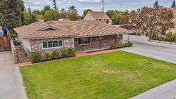 Pre-foreclosure in  N Maple Ave Fresno, CA 93703