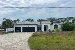 Pre-foreclosure in  Nw 28th Ave Cape Coral, FL 33993