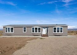 Pre-foreclosure in  W Desert Duck Ave Mountain Home, ID 83647