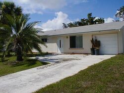 Pre-foreclosure in  SW Tulip Blvd Port Saint Lucie, FL 34953