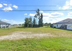 Pre-foreclosure in  SW 12th Ter Cape Coral, FL 33991