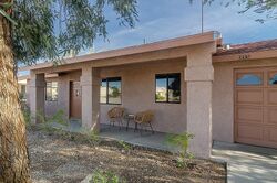 Pre-foreclosure in  Dolphin Dr Lake Havasu City, AZ 86406