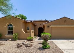 Pre-foreclosure in  W Wind Song Ave Goodyear, AZ 85338